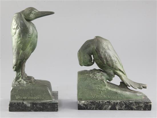After Van de Voorde. A pair of patinated spelter bookends, modelled as a parrot and a heron, Tallest 8.5in,